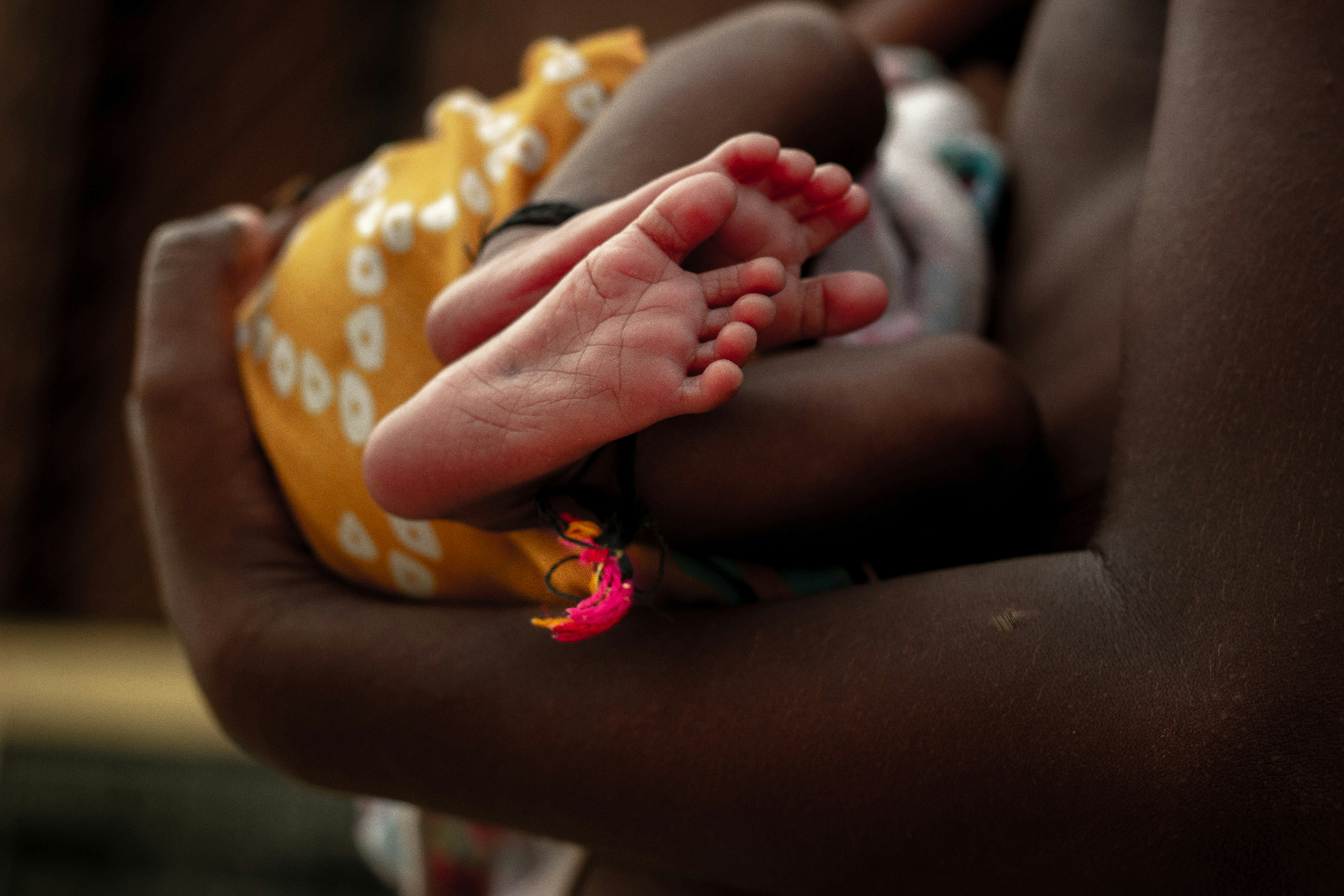 A newborn being transported for additional medical care