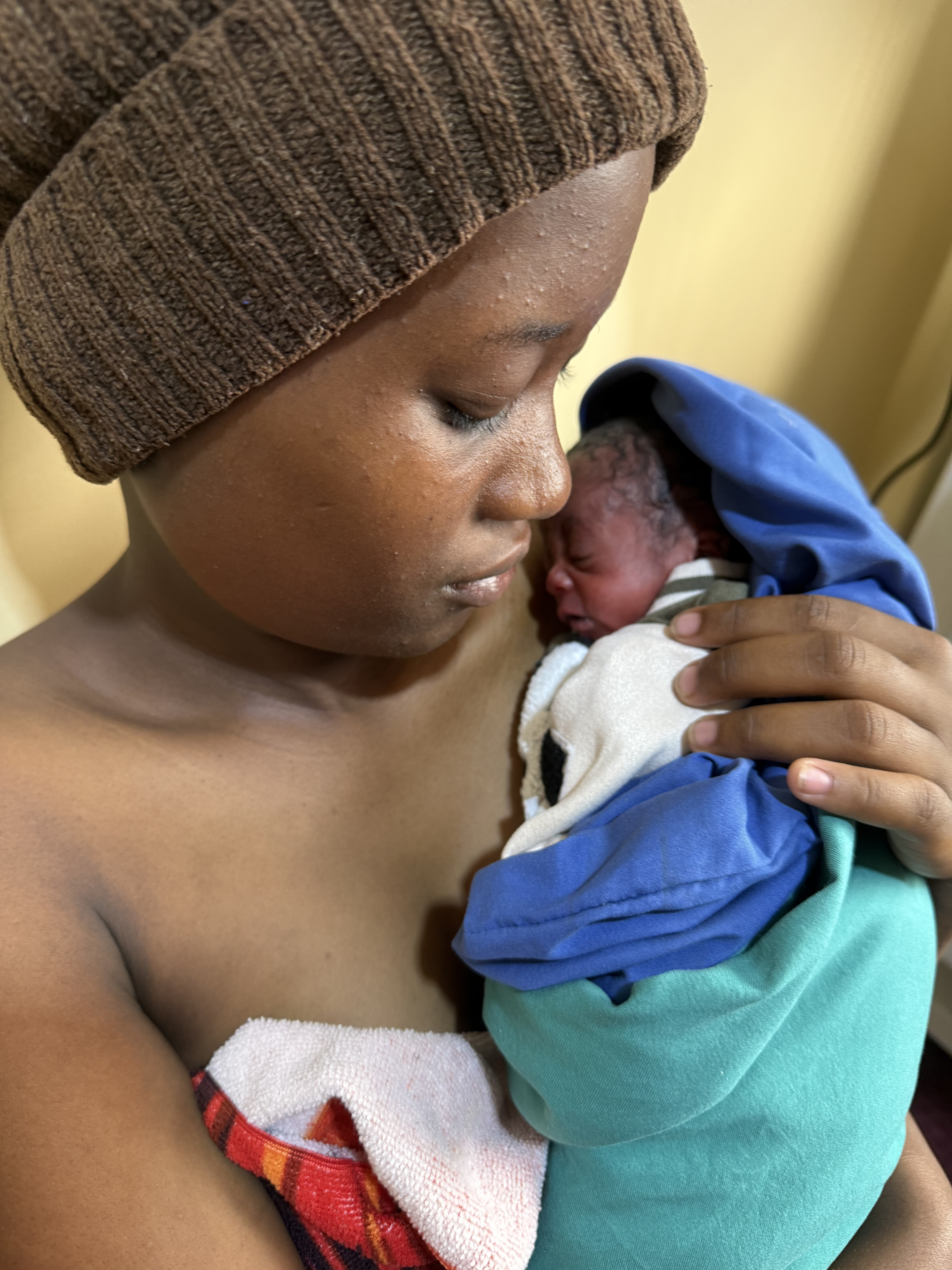 Baby Praise with her mother